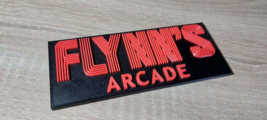 Flynn’s Arcade Tron 1982 Logo Sign – Classic Sci-Fi Movie Collectible for Retro Gaming Fans. - 3DEvricPrinting