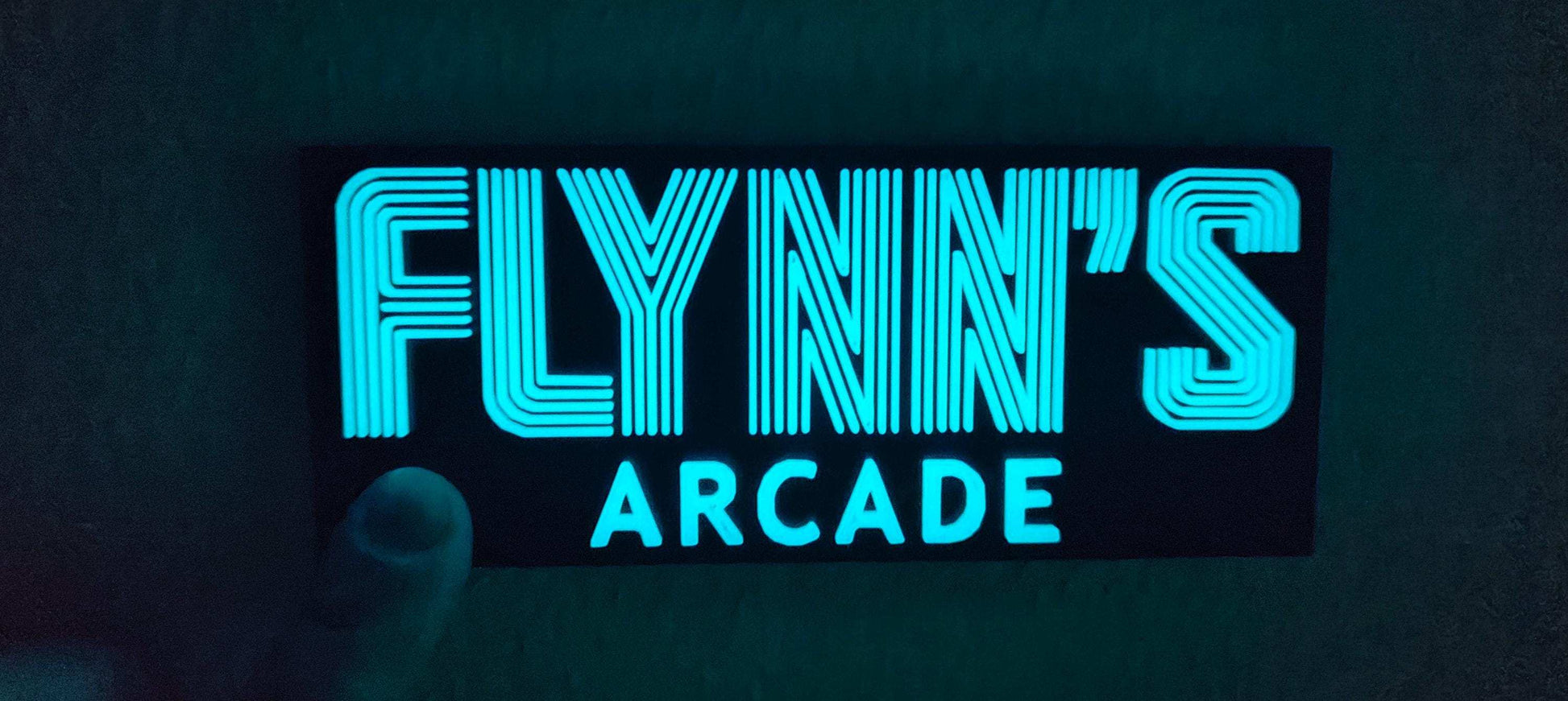 Flynn’s Arcade Tron 1982 Logo Sign – Classic Sci-Fi Movie Collectible for Retro Gaming Fans. - 3DEvricPrinting